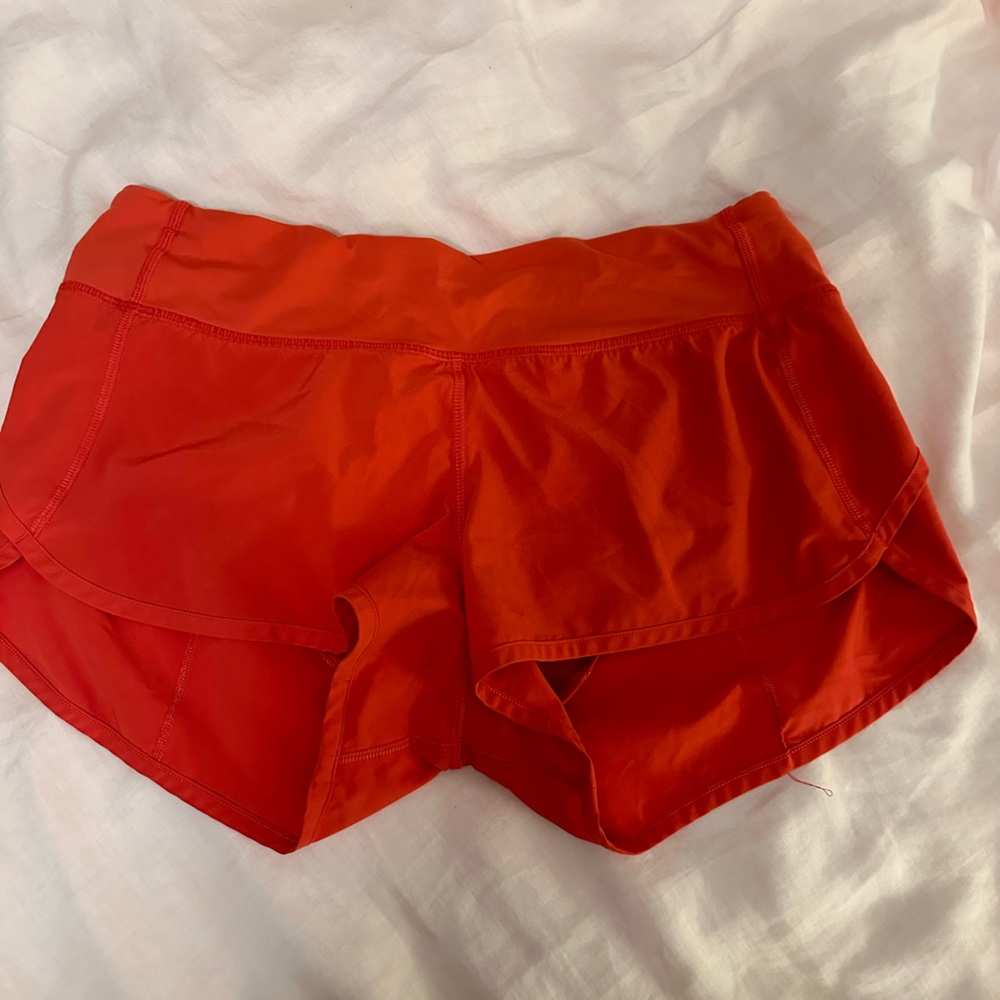 COPY - Lululemon size 6 speed up shorts. Orange ish red color